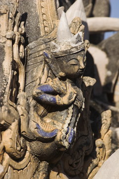Figure carved in stucco decorates one of the ancient stupas, Kakku Buddhist Ruins, a site of over two thousand brick and laterite stupas, said to date back to the 12th century, Shan State
