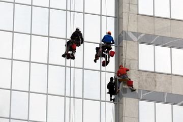 Men cleaning windows
