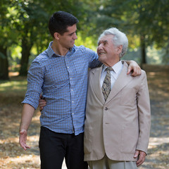 Fototapeta premium Father and son in park