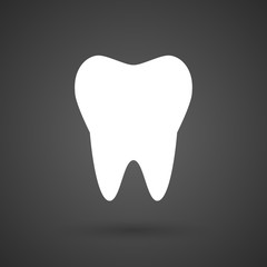   a tooth   white icon on a dark  background