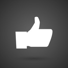 Obraz premium a thumb up hand white icon on a dark background