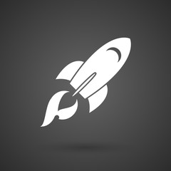  a rocket    white icon on a dark  background