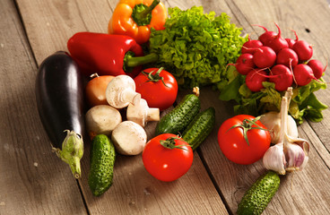 Fresh vegetables on a clean wooden table