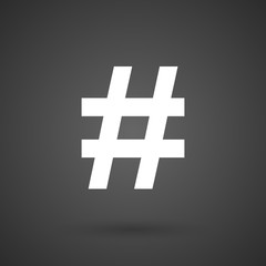 Fototapeta premium a hash tag white icon on a dark background