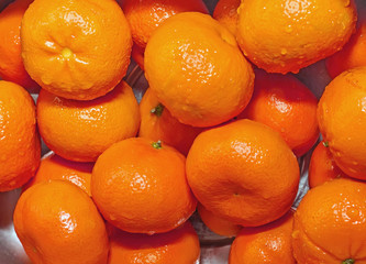 tangerines washed, Wash fresh mandarins in retro colander