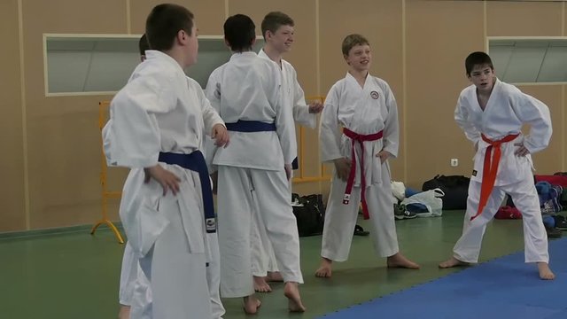 young karatekas warm up before competition
