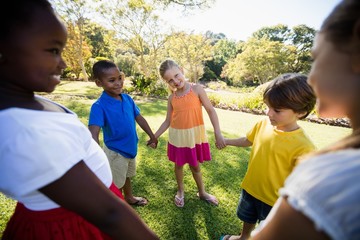 Kids playing together during a sunny day