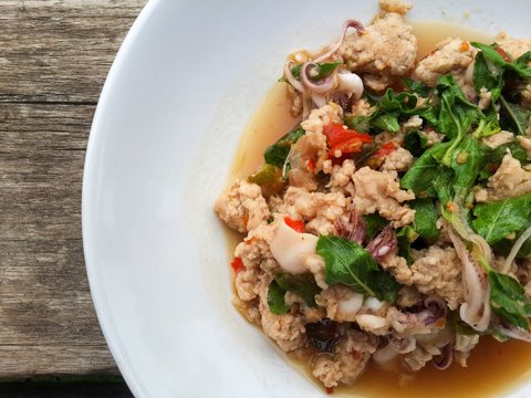 spicy pork basil and squid fried - Thailand style food