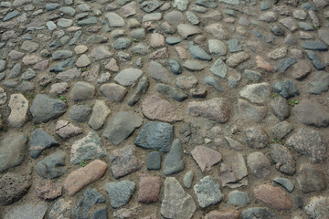 old bricks lined with granite stones