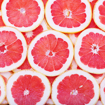 Fruits background macro. Citrus fruits top view macro, selective focus.