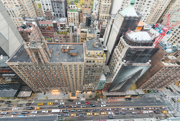 Overhead view of Manhattan buildings and streets at dusk. New Yo