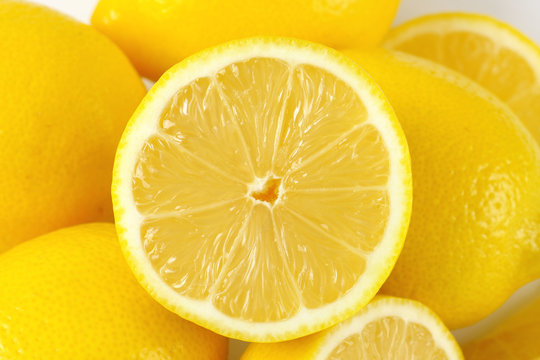 whole and halved lemons
