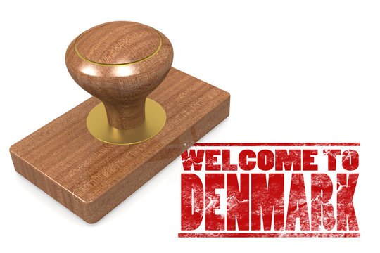 Red rubber stamp with welcome to Denmark