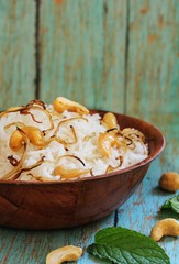 Ghee Rice / Nei choru - Rice cooked in clarified butter granished with fried onions and nuts