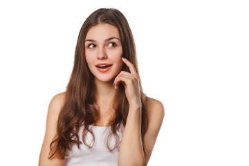 Fototapeta premium Young beautiful woman thinking looking to the side at blank copy space, isolated over white background