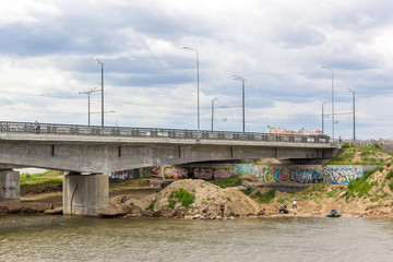 Kazan, Kremlin - June 06, 2015: Fishing and arts under on of the Kazan's bridge.