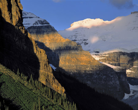 Canada, Alberta, Rocky Mountains. Victoria Glacier and the Canadian Rockies above Lake Louise are blanketed by snow, Banff NP, a World Heritage Site, Alberta, Canada. 