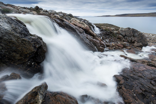 Waterfall along Hudson Bay, Repulse Bay, Nunavut Territory, Canada