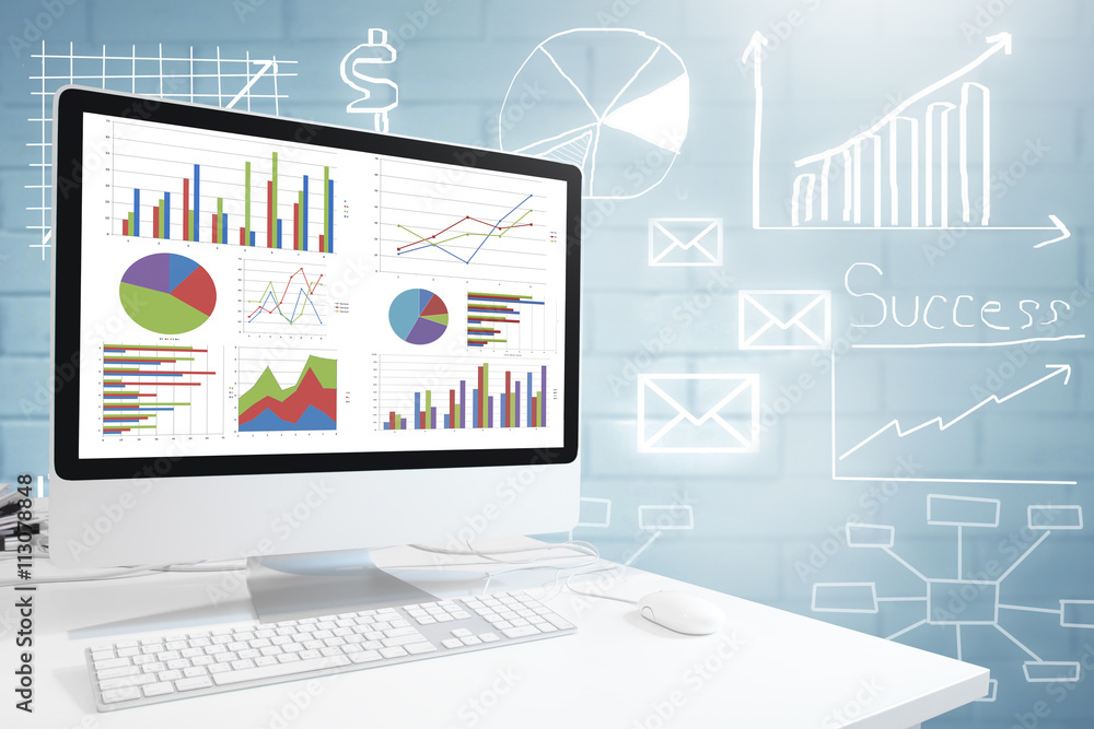 Poster Modern computer with keyboard and mouse on table showing charts