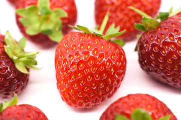 Line of red strawberries