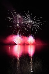 Beautiful colorful fireworks on water. Brno dam. International Fireworks Competition Ignis Brunensis. Brno - Czech Republic - Europe.