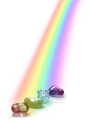 Rainbow Illuminated Healing Crystals - three crystals and a Merkabah bathed in the light of a falling rainbow on a white background