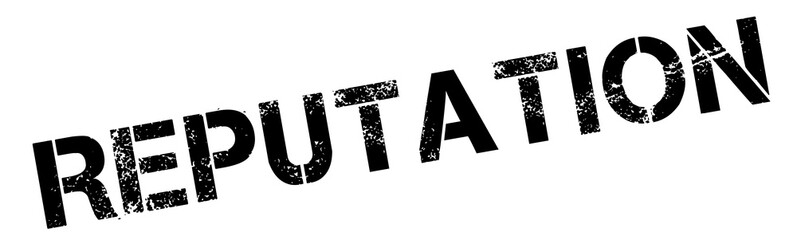 Reputation black rubber stamp on white