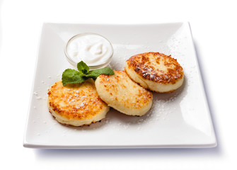 Cottage cheese pancakes with sour cream