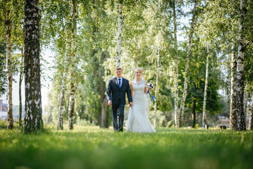 Fototapeta premium Beautiful wedding couple is enjoying wedding