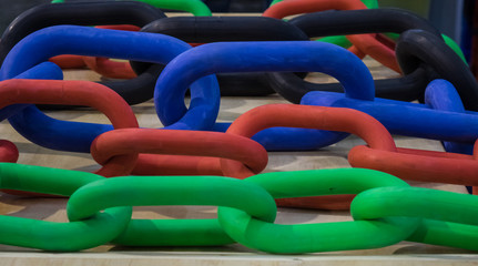 The multicolored  plastic chains  in a fitness center