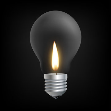 Candle light in Incandescent Light bulb concept