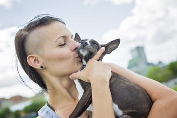 Obraz premium girl with a dog in the park