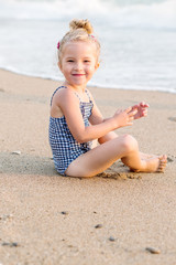 Portrait of a happy charming little girl