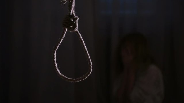 suicide. Girl on the background of the loop for the neck.