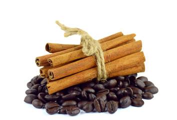Coffee beans and cinnamon sticks.