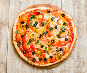 pizza on the wood background
