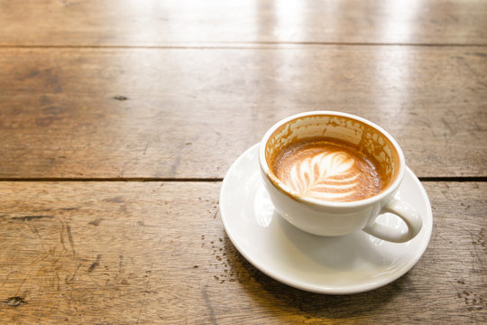 Coffee on wood background