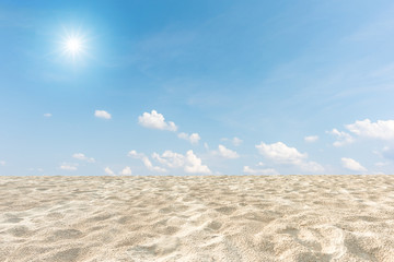 Fototapeta na wymiar Sand dunes and blue sky with sun
