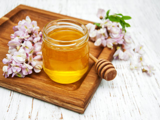 Obraz na płótnie Canvas honey with acacia blossoms