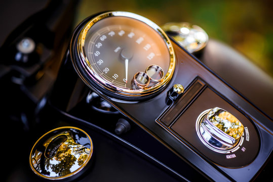 Wedding Rings On A Motorcycle Speedometer