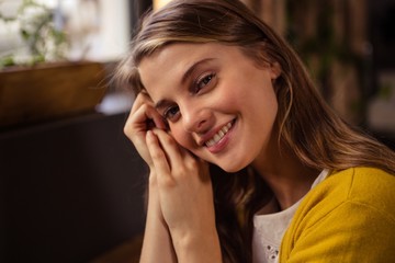 Smiling casual woman alone