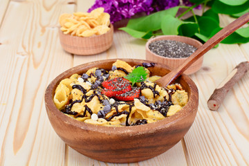 Cornflakes with Strawberry and Chocolate. Healthy Breakfast
