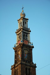 Fototapeta na wymiar Bell tower of West Church (Westerkerk) in Amsterdam, Holland