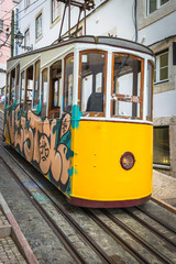 Naklejka premium Romantic yellow tramway - main symbol of Lisbon, Portugal