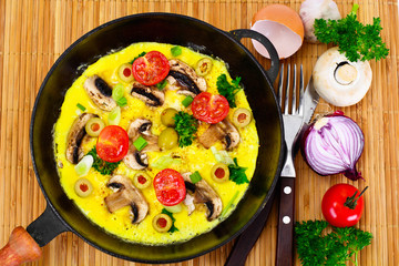 Healthy and Diet Food: Scrambled Eggs with Mushrooms and Vegetab