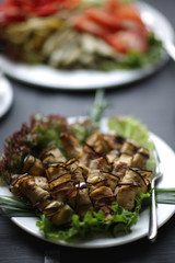 Eggplant rolls served on a table