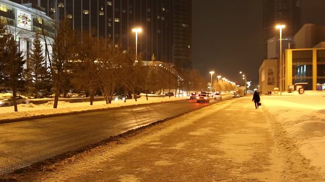 The lively movement of cars on winter street