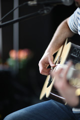 Man playing guitar on the stage