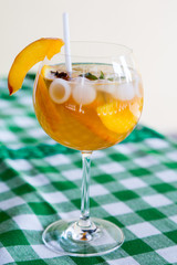 fresh Cocktail Orange juice with mint and ice on table