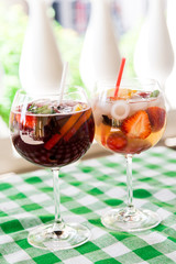 fresh Cocktail juice with mint and ice on table. Healthy organic drinks. Fresh mojito drink with ice and fruit